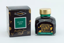 Load image into Gallery viewer, A glass bottle of 80ml Diamine Delamere Green fountain pen ink next to its packaging box, in front of a white background.
