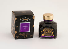 Load image into Gallery viewer, A glass bottle of 80ml Diamine Monboddos Hat fountain pen ink next to its packaging box, in front of a white background.
