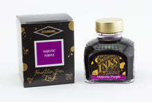 Load image into Gallery viewer, A glass bottle of 80ml Diamine Majestic Purple fountain pen ink next to its packaging box, in front of a white background.
