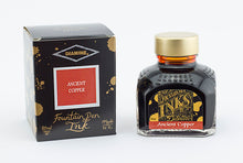 Load image into Gallery viewer, A glass bottle of 80ml Diamine Ancient Copper fountain pen ink next to its packaging box, in front of a white background.

