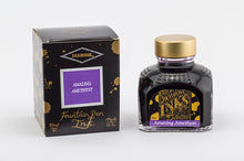Load image into Gallery viewer, A glass bottle of 80ml Diamine Amazing Amethyst fountain pen ink next to its packaging box, in front of a white background.
