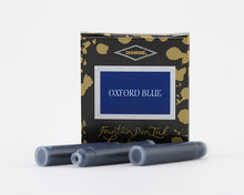 Load image into Gallery viewer, A packet of 6 Diamine fountain pen ink cartridges in Oxford Blue, in front of a white background.
