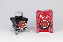 Load image into Gallery viewer, A glass bottle of 50ml Diamine Red Edition Inkvent Red Robin fountain pen ink next to packaging box, in front of a white background.
