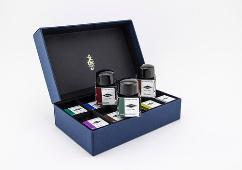 A gift set of 10 x glass bottle of 30ml Diamine fountain pen ink in assorted classical musician inspired colours.