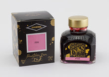 Load image into Gallery viewer, A glass bottle of 80ml Diamine Pink fountain pen ink next to its packaging box, in front of a white background.
